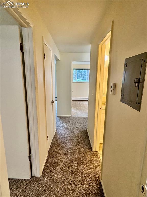 Image 13 of 27: Unit 3 hallway looking towards kitchen