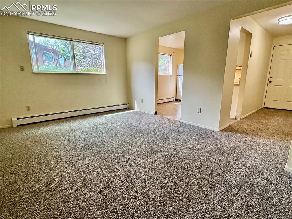 Image 6 of 27: Unit 4 Living room
