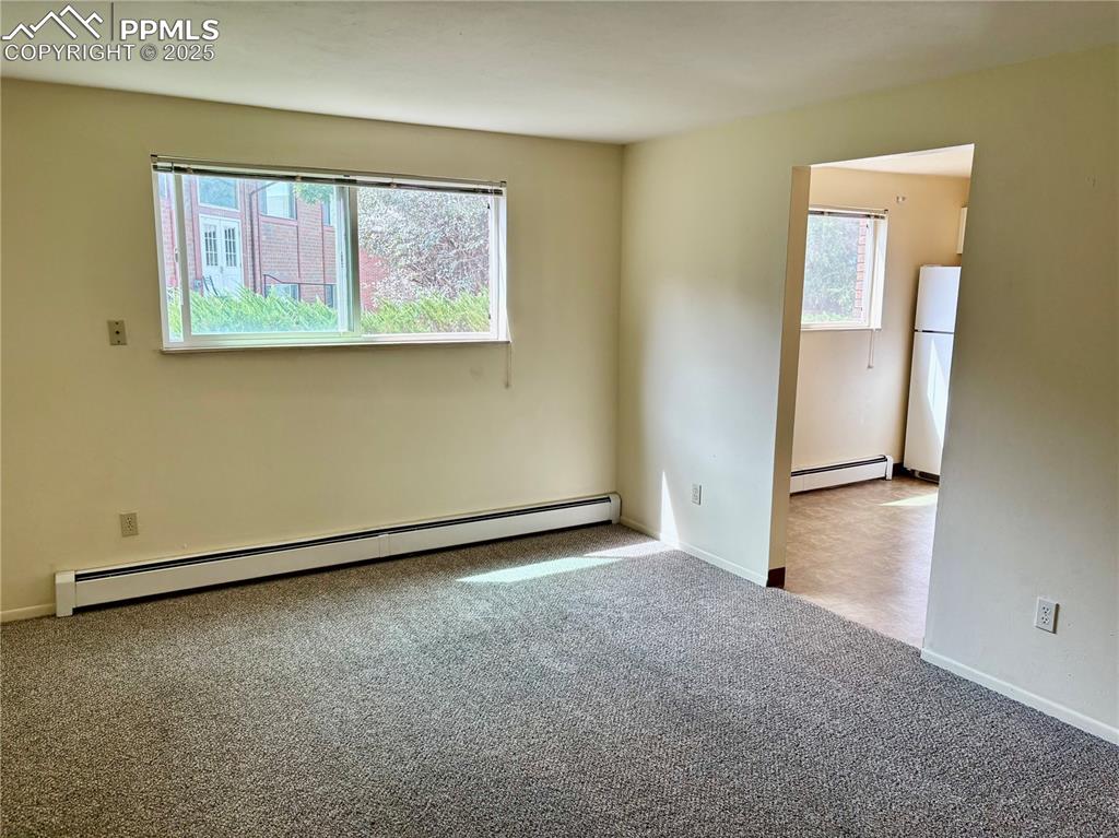 Image 7 of 27: Unit 4 living room
