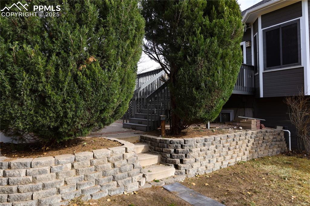 Image 44 of 49: Tasteful landscape and design throughout.