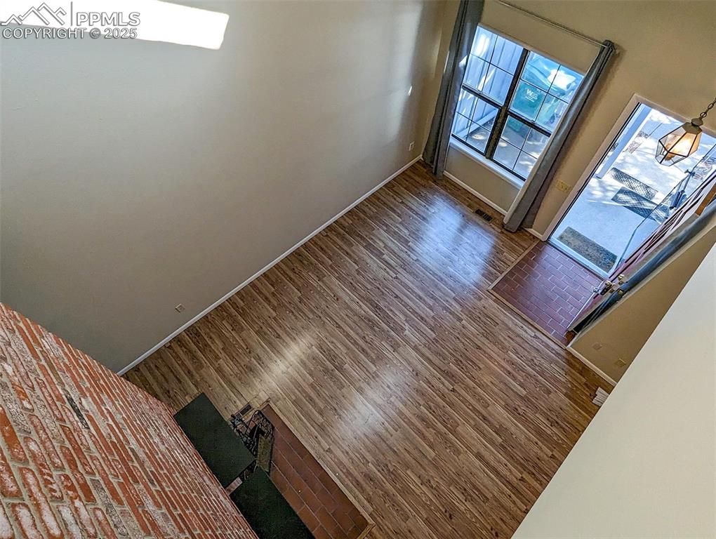 Image 18 of 27: View of Main Level Living Room from Loft