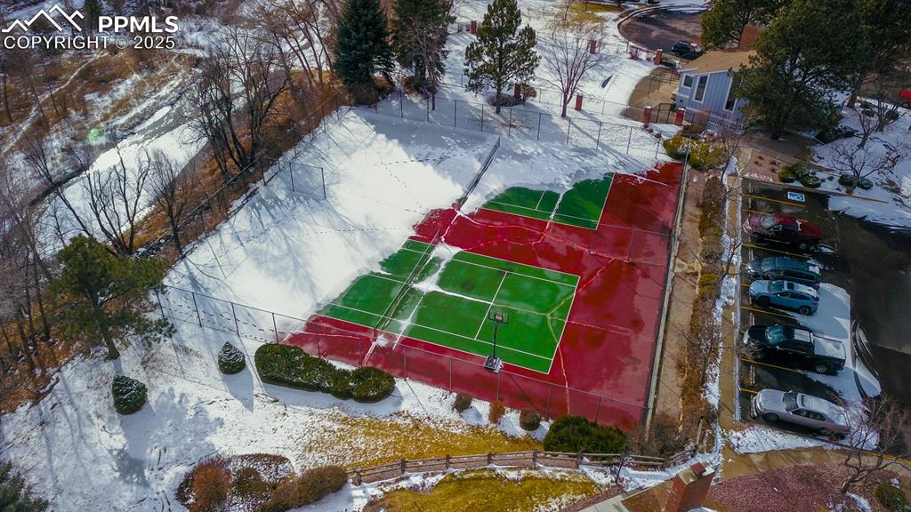 Image 7 of 27: Aerial view of Sports Court, Pool, and Clubhouse