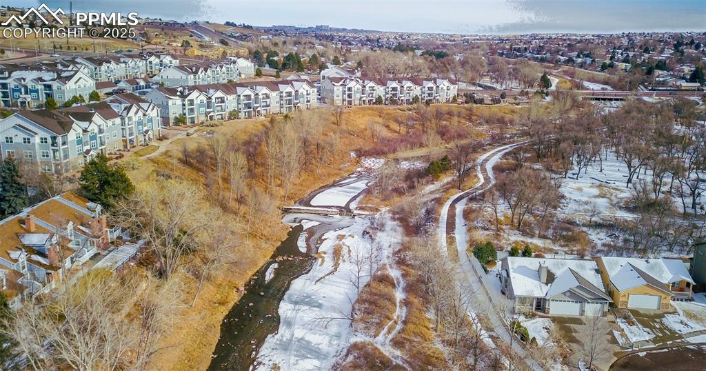 Image 8 of 27: Cottonwood Creek on the Southside of Community