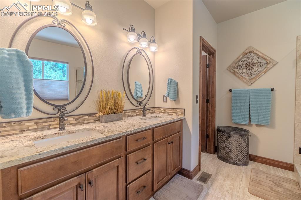 Image 22 of 50: Master Bathroom