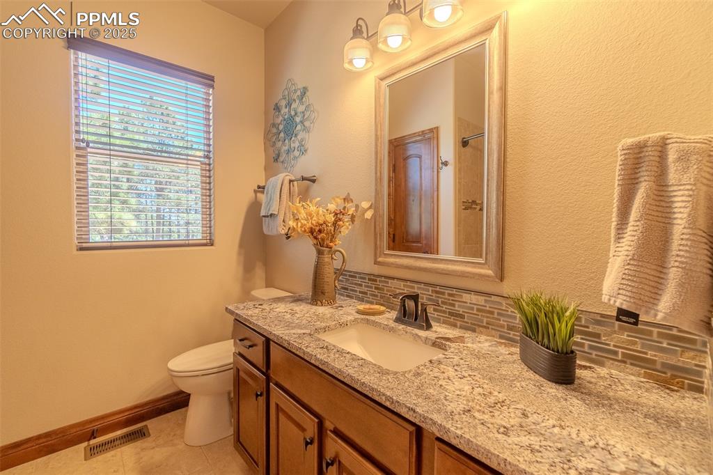 Image 27 of 50: main level full bathroom