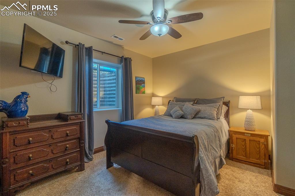 Image 36 of 50: Additional bedroom on lower level