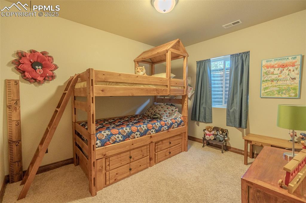 Image 37 of 50: 5th bedroom in basement