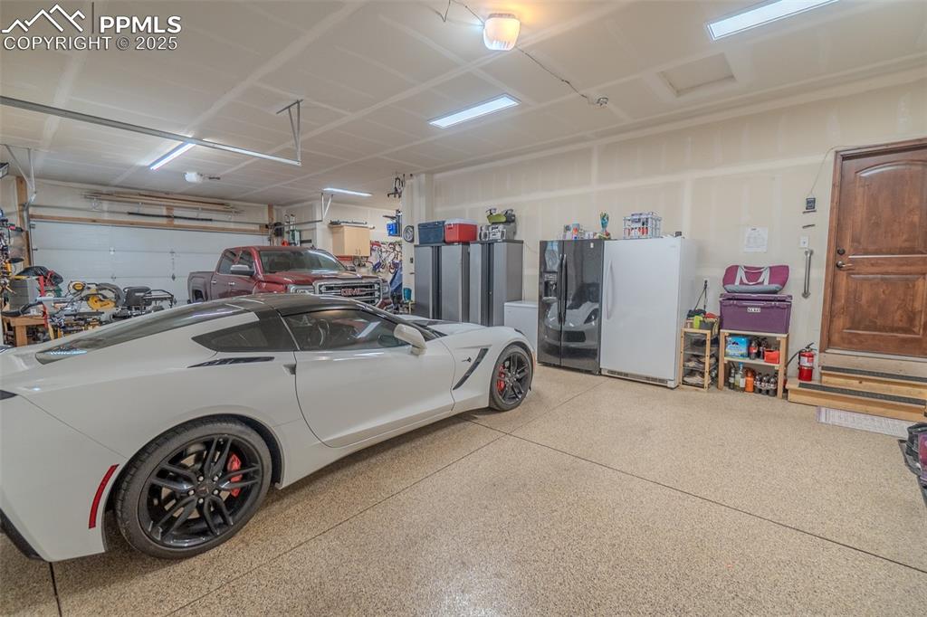 Image 42 of 50: Oversized 5-car garage