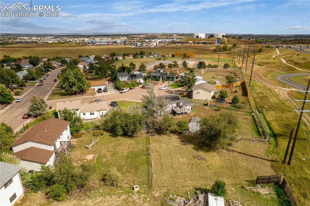 Image 33 of 34: View of property location with nearby suburban area