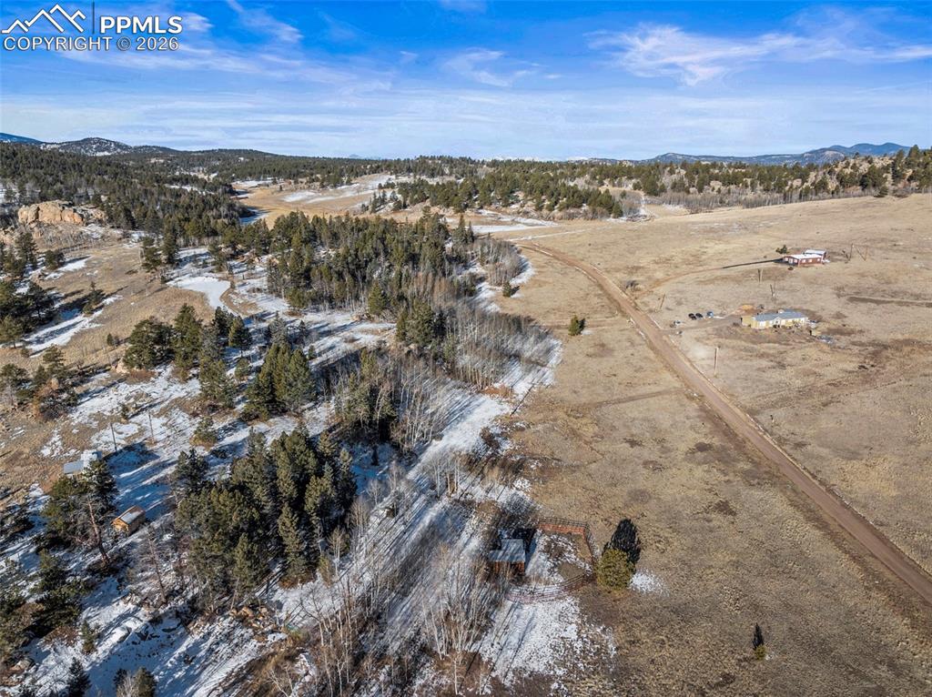 Image 16 of 25: Aerial overview of property