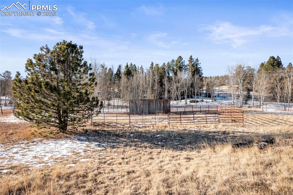 Image 18 of 25: View of yard with a view of countryside