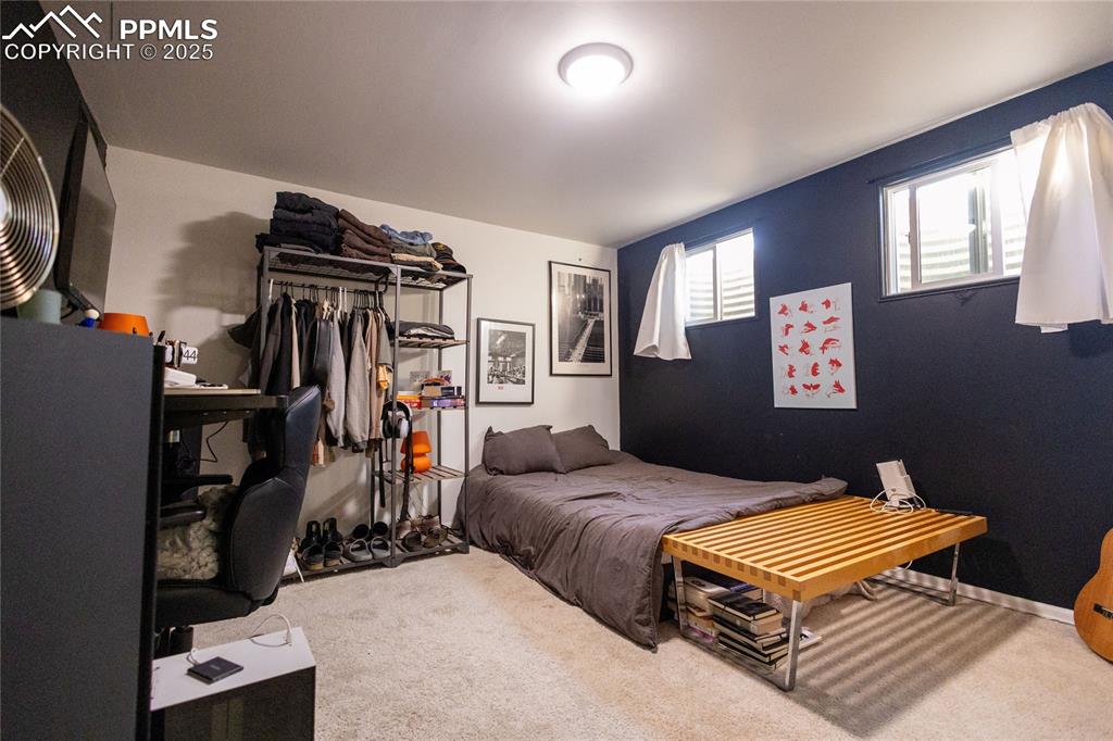 Image 17 of 27: Bedroom featuring carpet