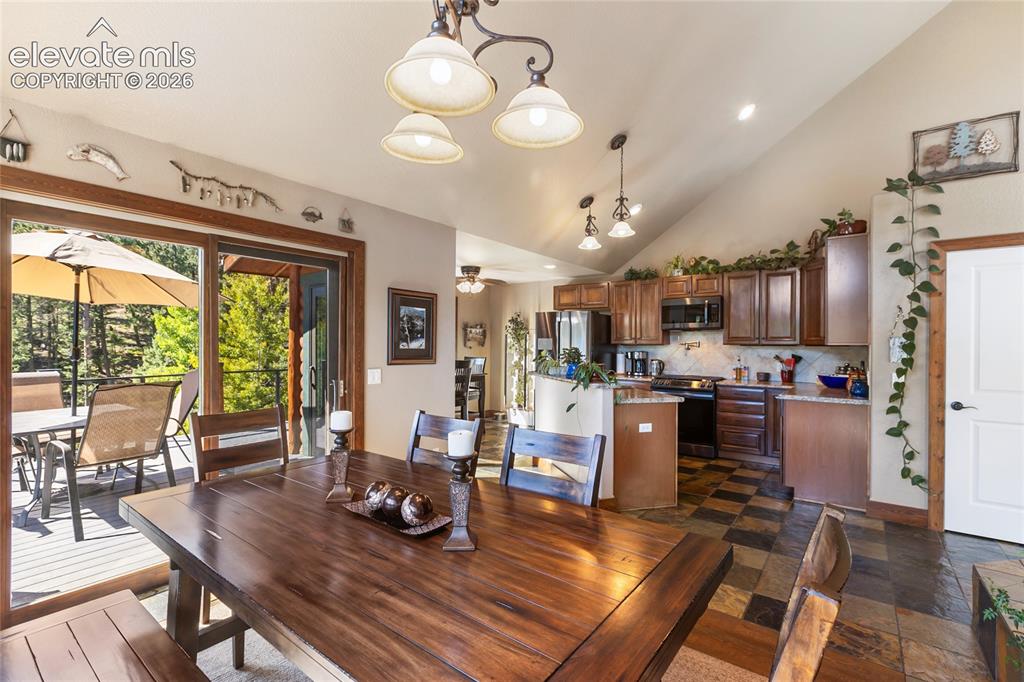 Image 10 of 31: I love this open concept kitchen to dining to outdoor living area!