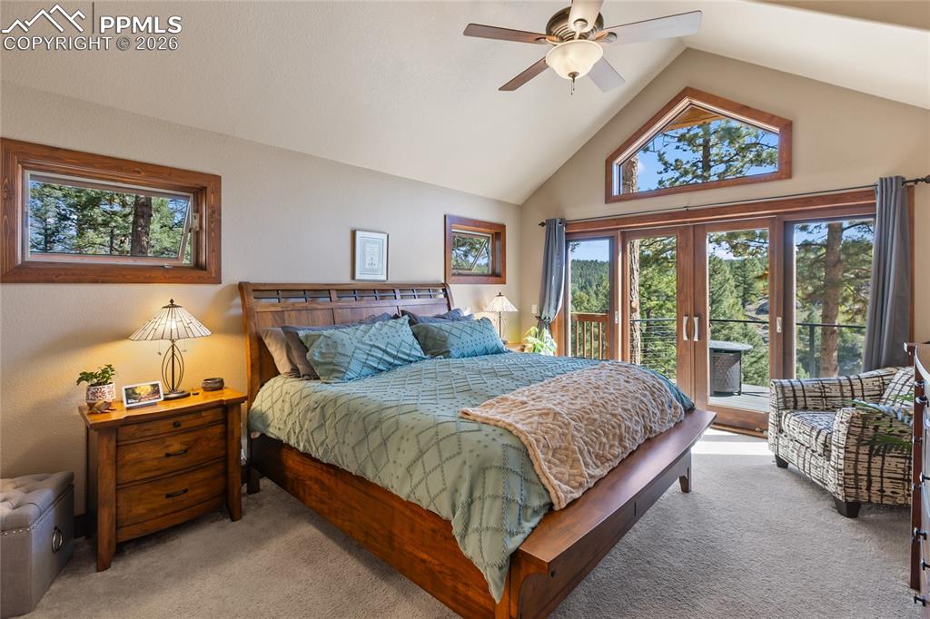 Image 12 of 31: Main level primary with a walk out to your private area of the deck!