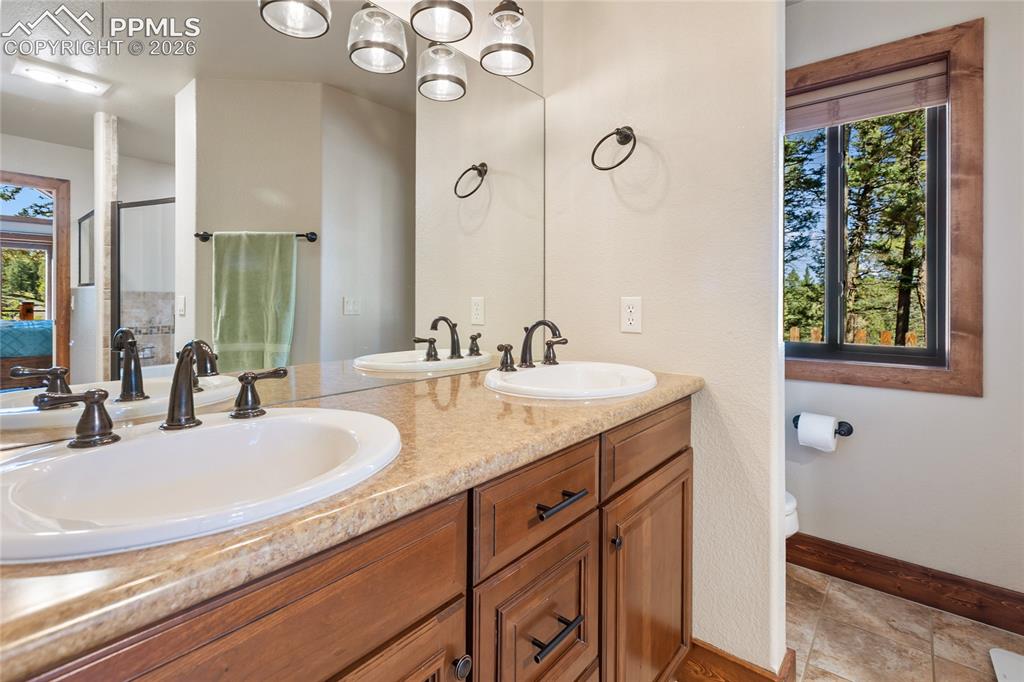 Image 13 of 31: Main level Primary bath...very spacious!
