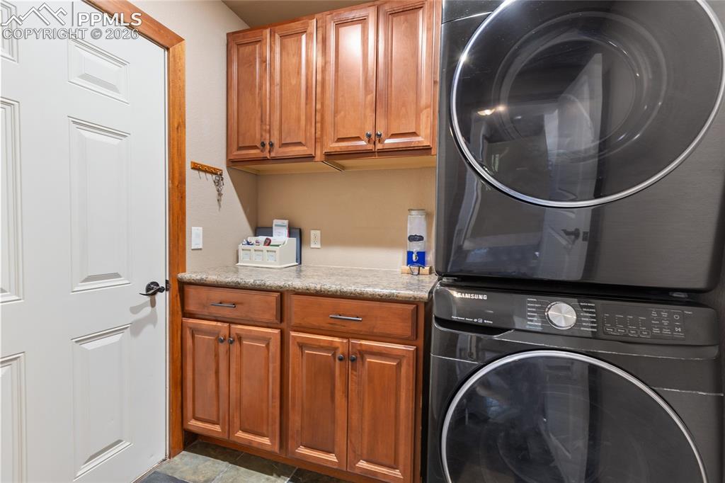 Image 15 of 31: Main level mudroom/laundry room combo