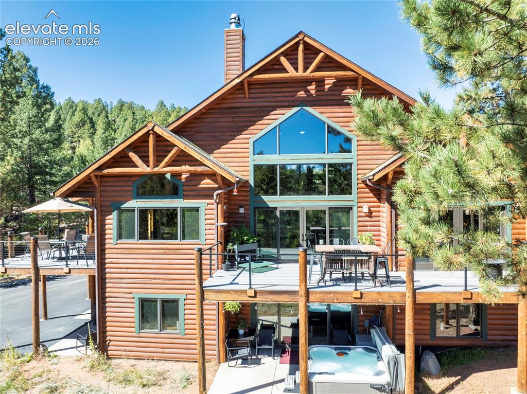 Image 6 of 31: This one has it all! Mountain cabin feel, multiple decks to enhance outdoo