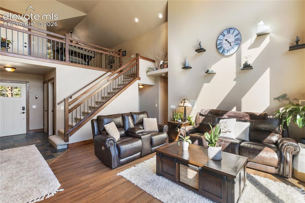 Image 8 of 31: You can see the sun pouring into the Living room which always makes you fee