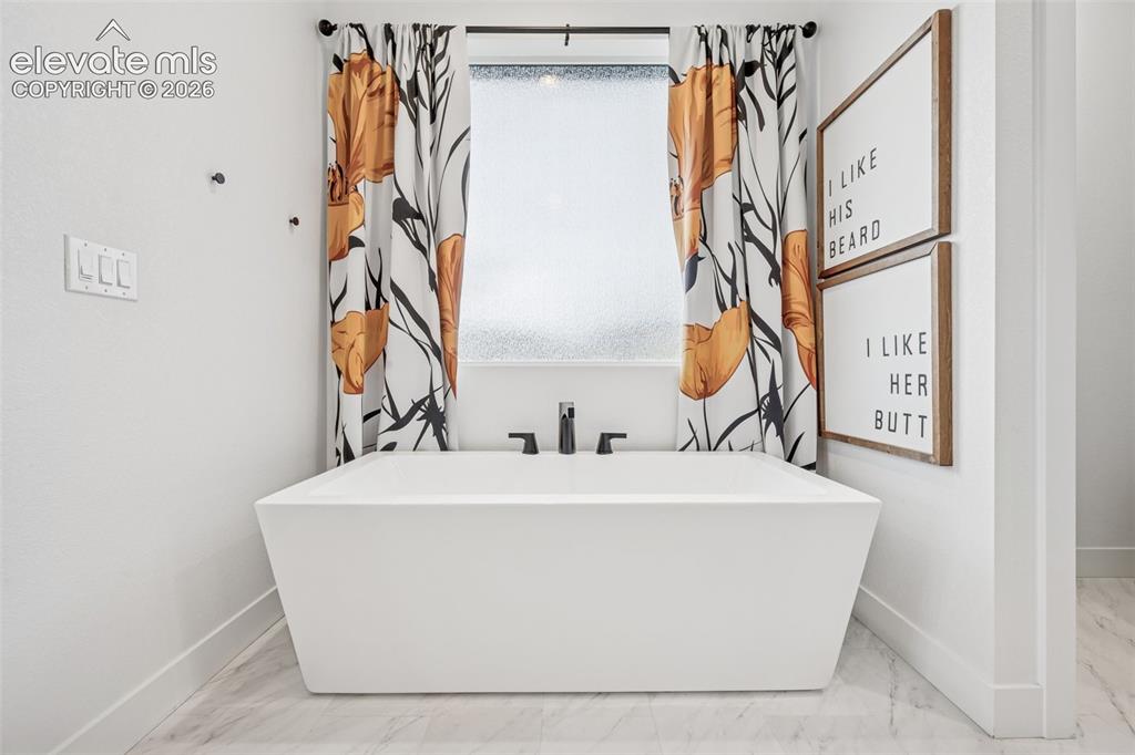 Image 32 of 49: Master Bathroom