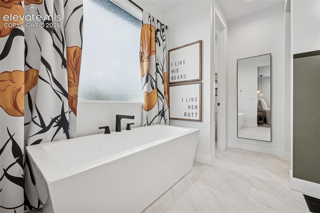 Image 33 of 49: Master Bathroom