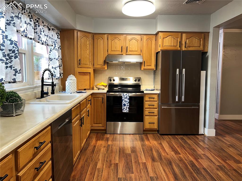 Image 13 of 43: Updated stainless appliances