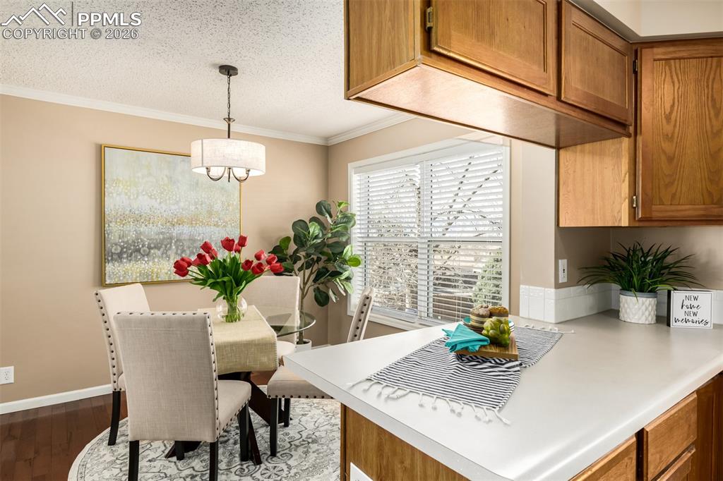 Image 10 of 30: Dining area off the kitchen makes for easy entertaining