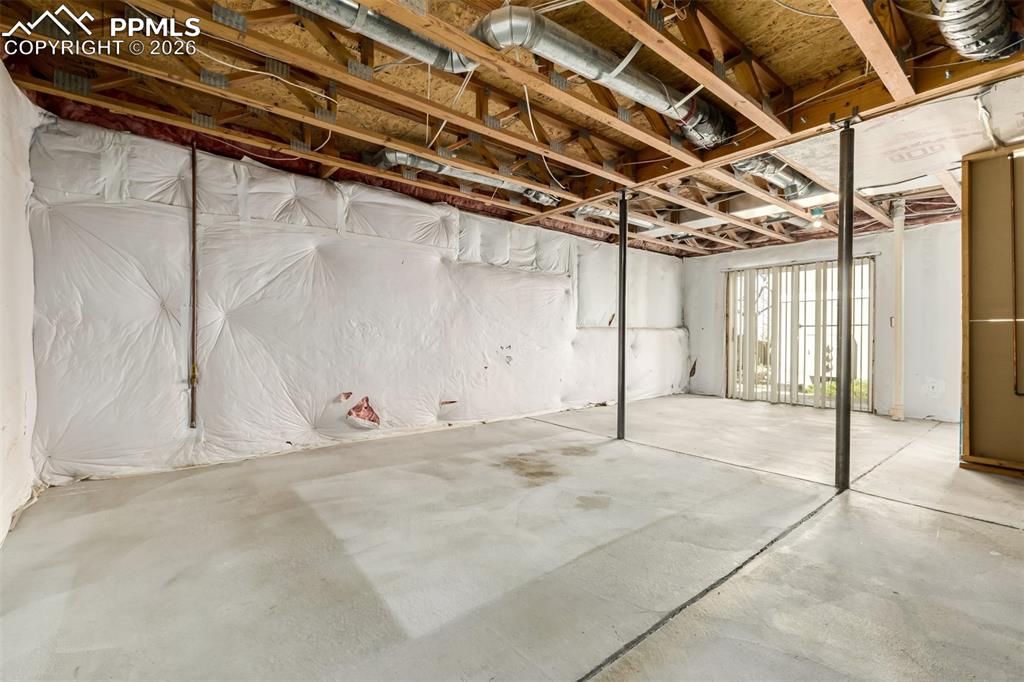 Image 21 of 30: View of walk-out basement pre-plumbed for an additional bathroom 