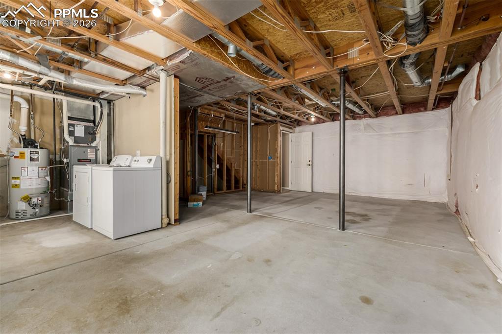 Image 22 of 30: View of walk-out basement pre-plumbed for an additional bathroom