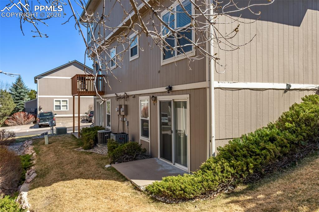 Image 23 of 30: Walk-out basement with patio
