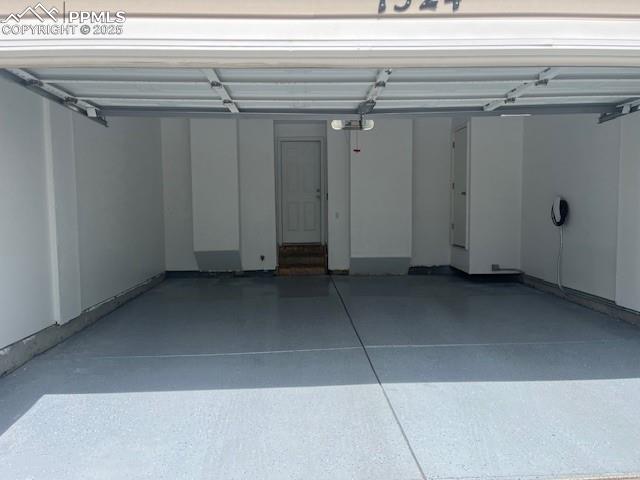 Image 28 of 29: 2 Car Garage w/ Epoxied Floor