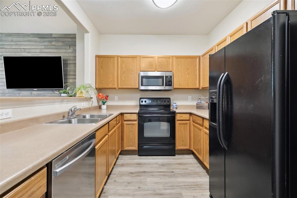 Image 9 of 29: Ample Counterspace & Cabinet Storage