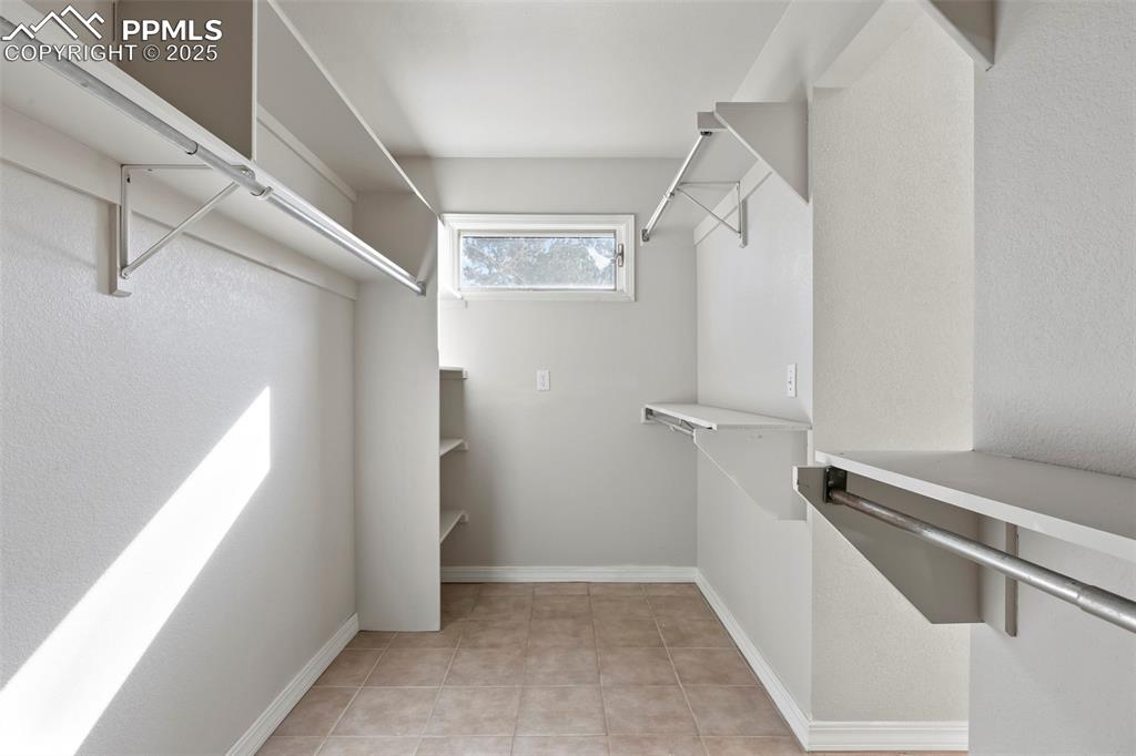 Image 16 of 35: Primary closet