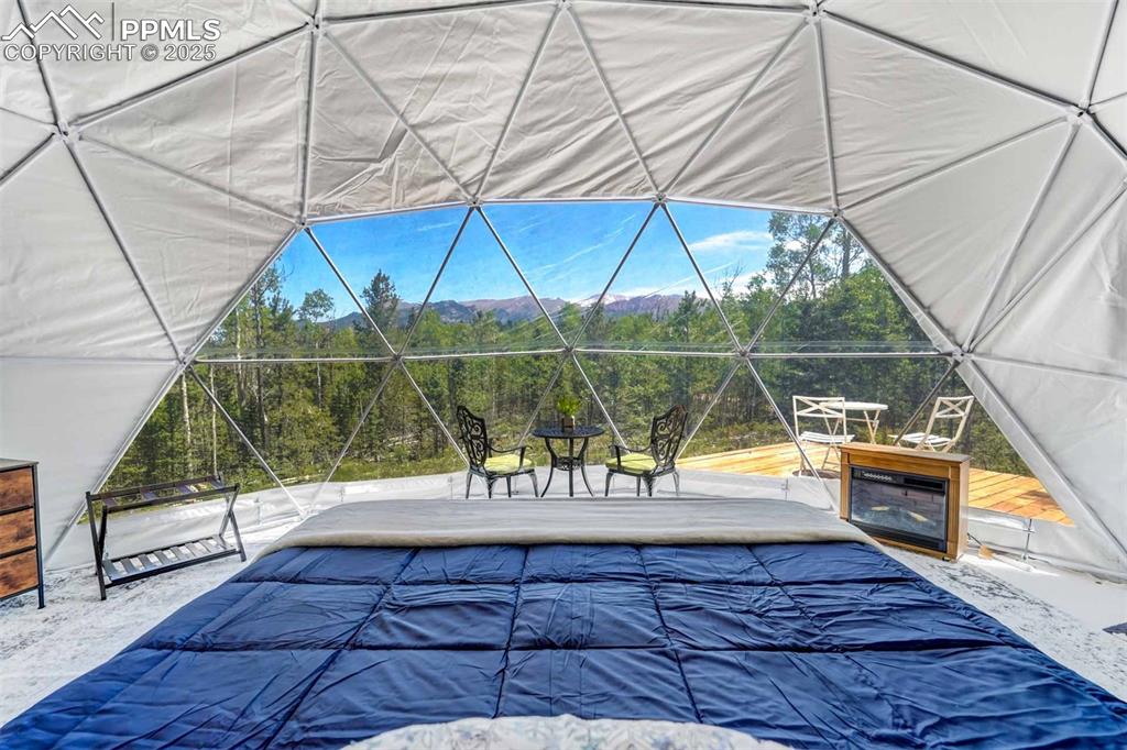 Image 41 of 50: View from the king bed in the bubble tent.  All furniture in the bubble is 