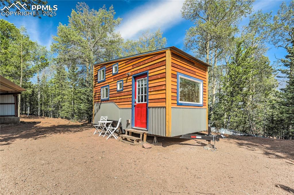 Image 43 of 50: Tiny home is negotiable. It is 8 ft x 18 ft.