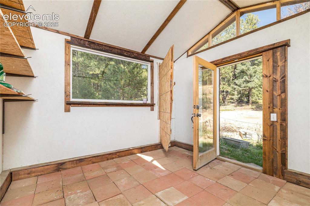 Image 40 of 47: Interior of finished Shed/Can also be used as an office.
