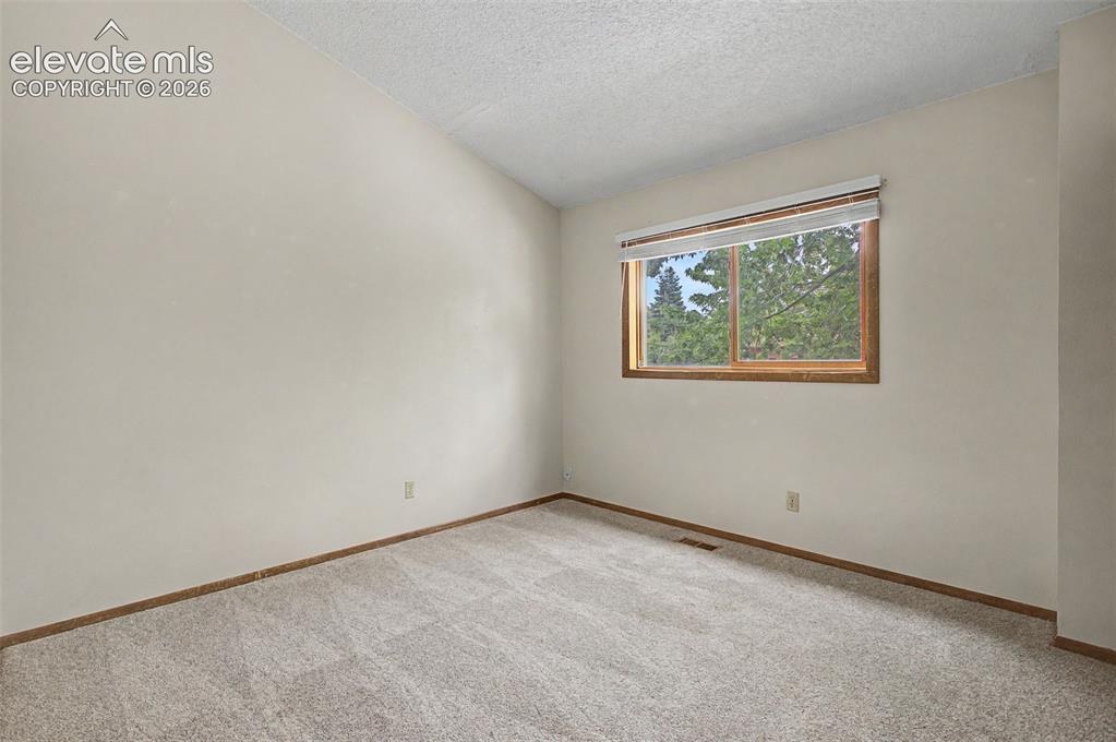 Image 21 of 29: Bedroom