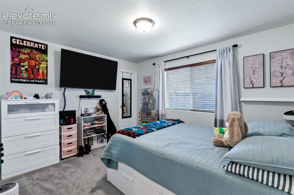 Image 18 of 38: Bedroom