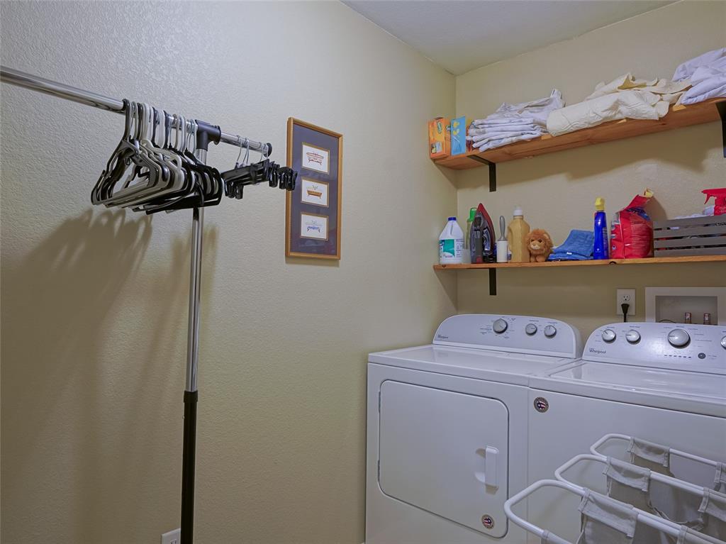 Image 12 of 31: Upper level laundry