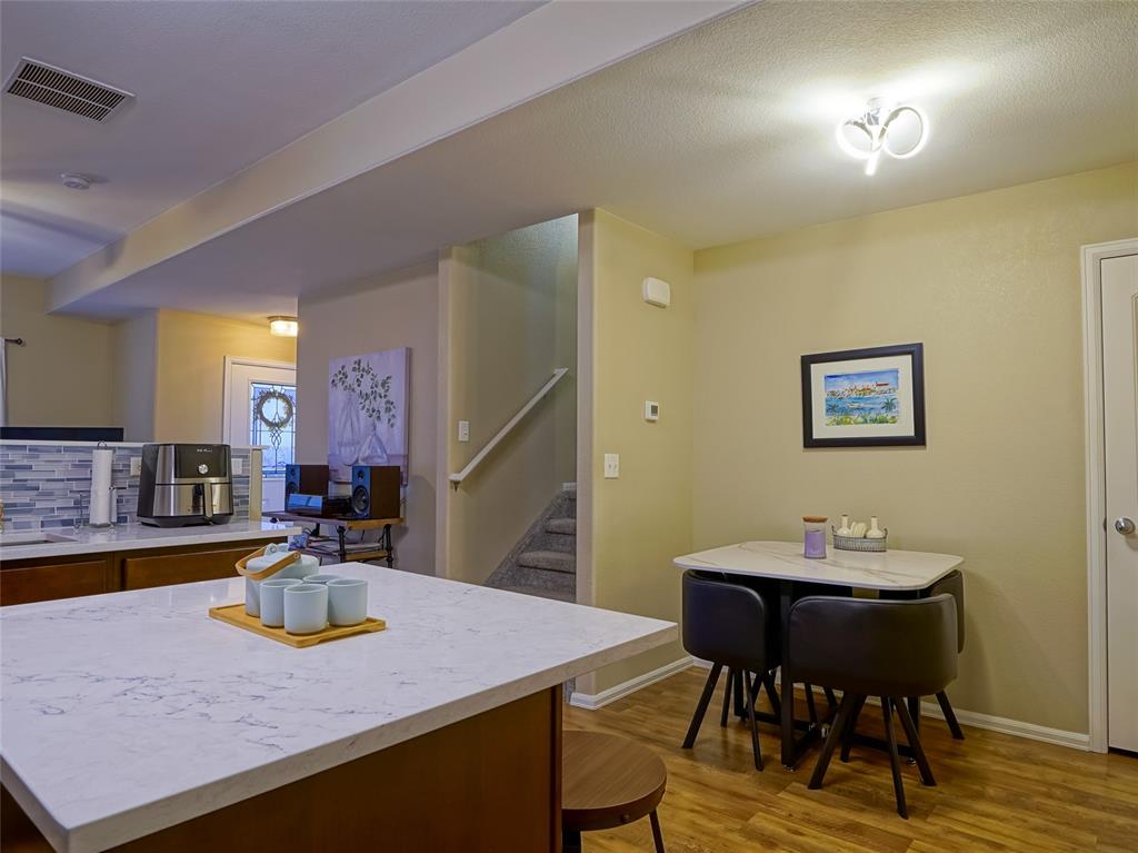 Image 9 of 31: Kitchen and Dining View 2