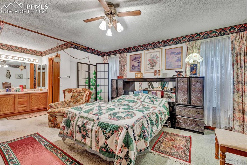 Image 10 of 21: Spacious primary suite with plenty of room to unwind — bring your design id