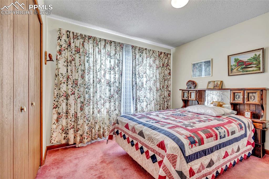 Image 16 of 21: Bright and cheerful with large windows and soft natural light — a cozy spot