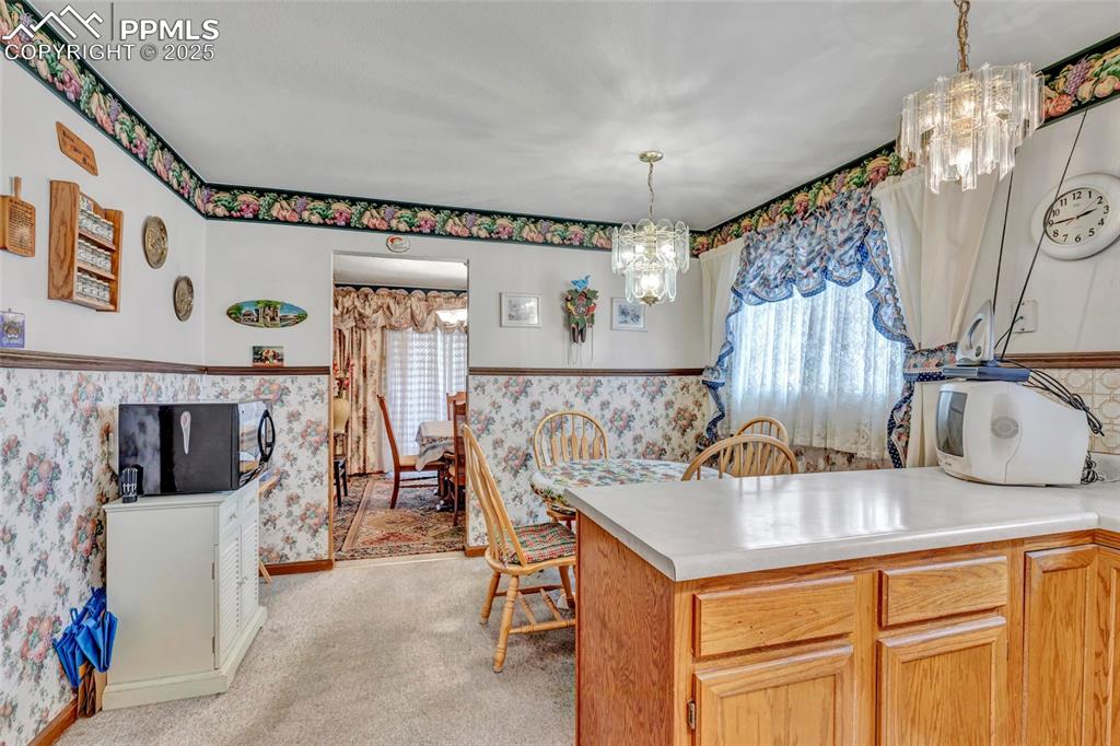 Image 7 of 21: The heart of the home! Bright, welcoming, and perfect for casual meals or c