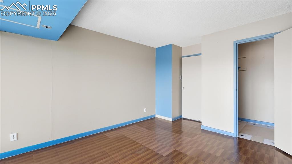 Image 26 of 31: Walk-in closet in the Primary Bedroom.