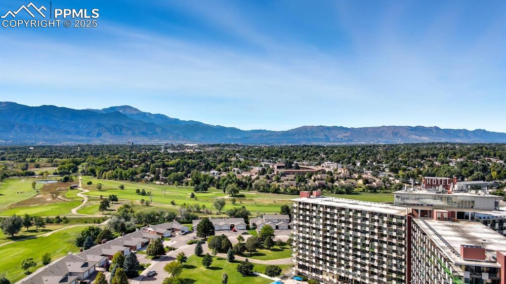 Image 3 of 31: Surrounded by golf course, mountain, and Pikes Peak views!