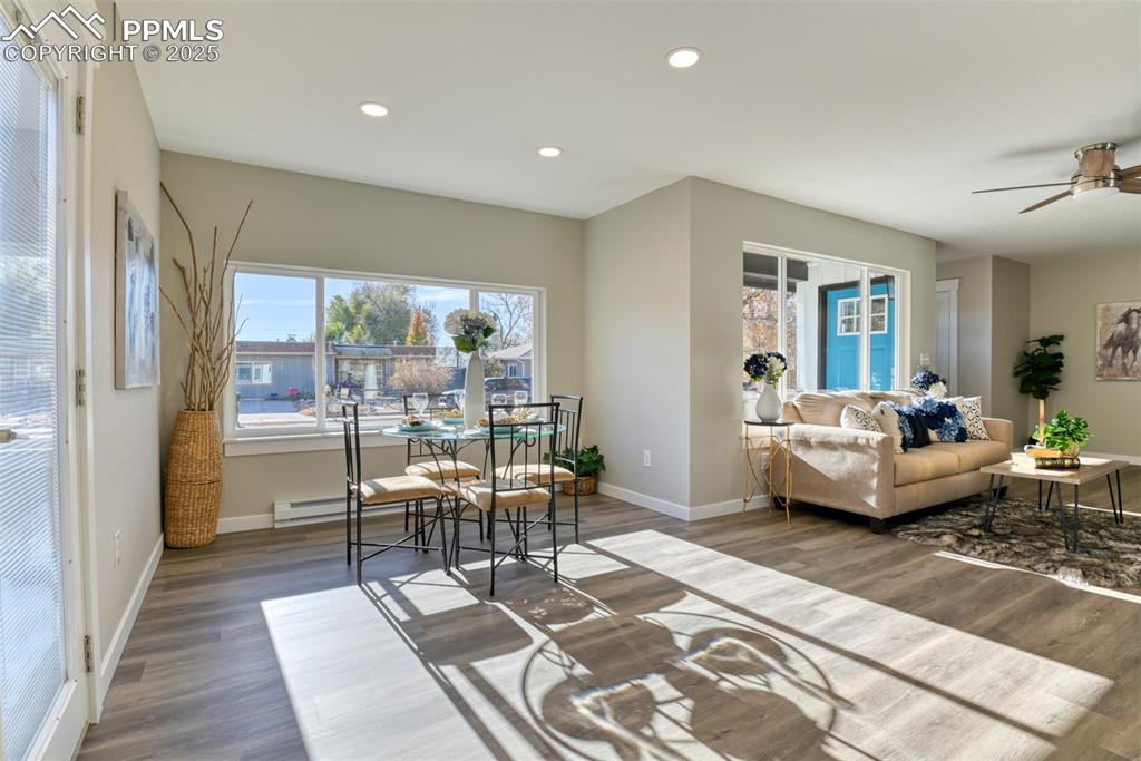 Image 24 of 48: Living area with recessed lighting, dark wood finished floors, and ceiling 
