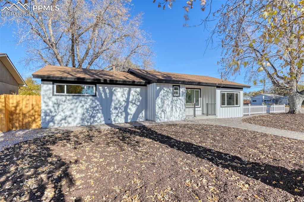 Image 4 of 48: View of ranch-style house