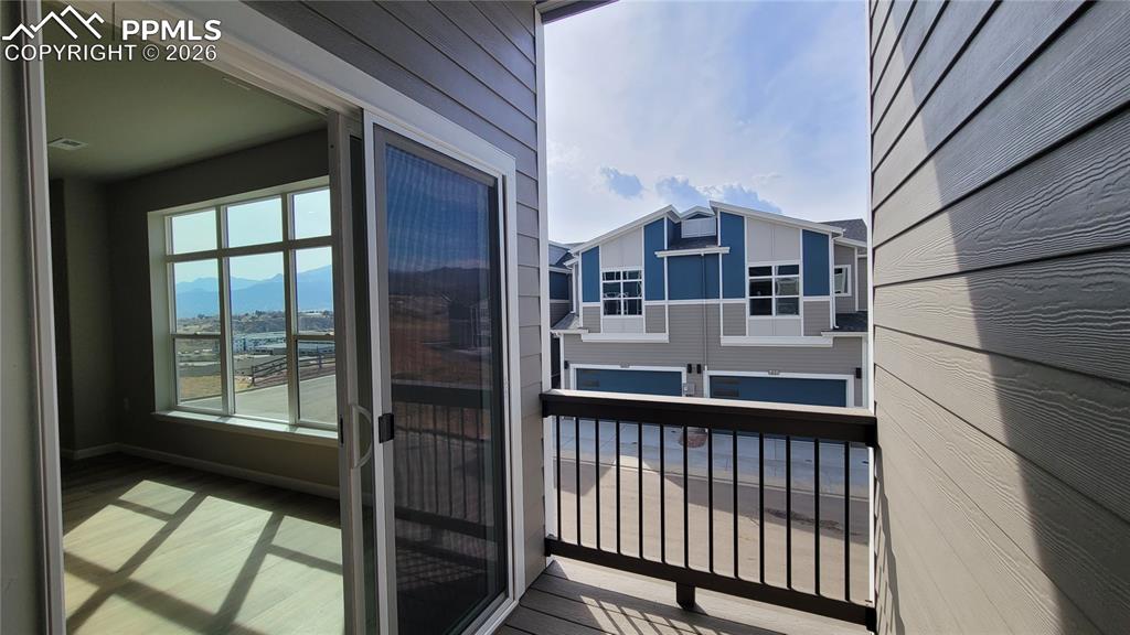 Image 10 of 26: Composite Deck off the Living Room! 