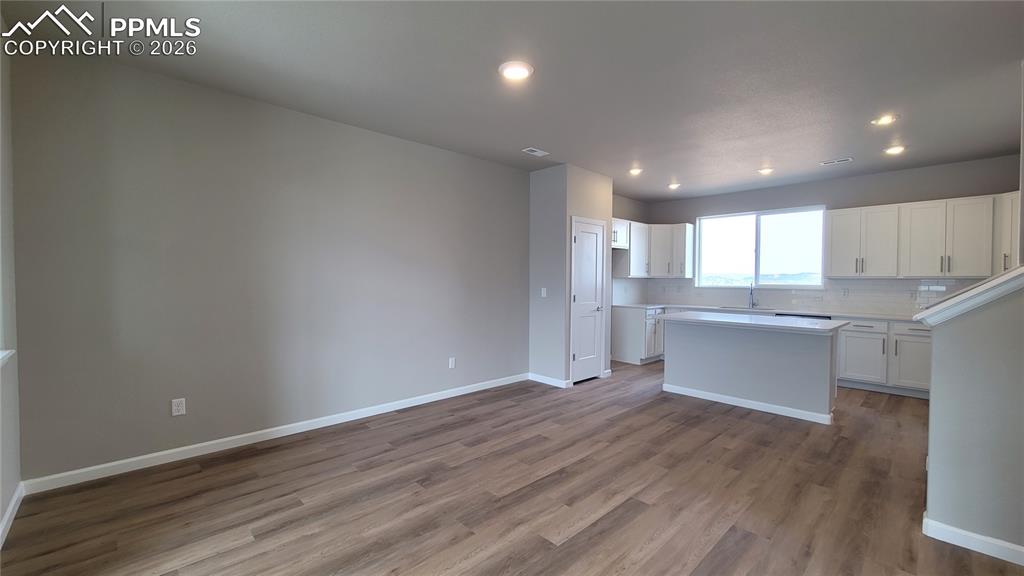 Image 11 of 26: Dining Area with LVP flooring ready to host! 