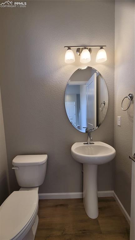 Image 15 of 26: Powder Room located on the main level! 