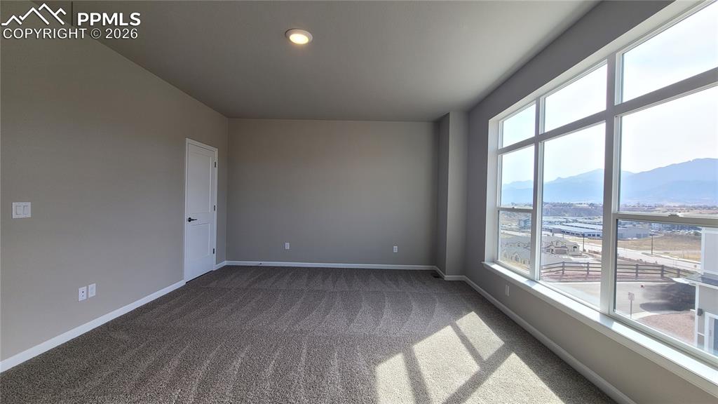 Image 17 of 26: Primary Suite is accompanied with a plush bathroom, walk-in closet, and pri